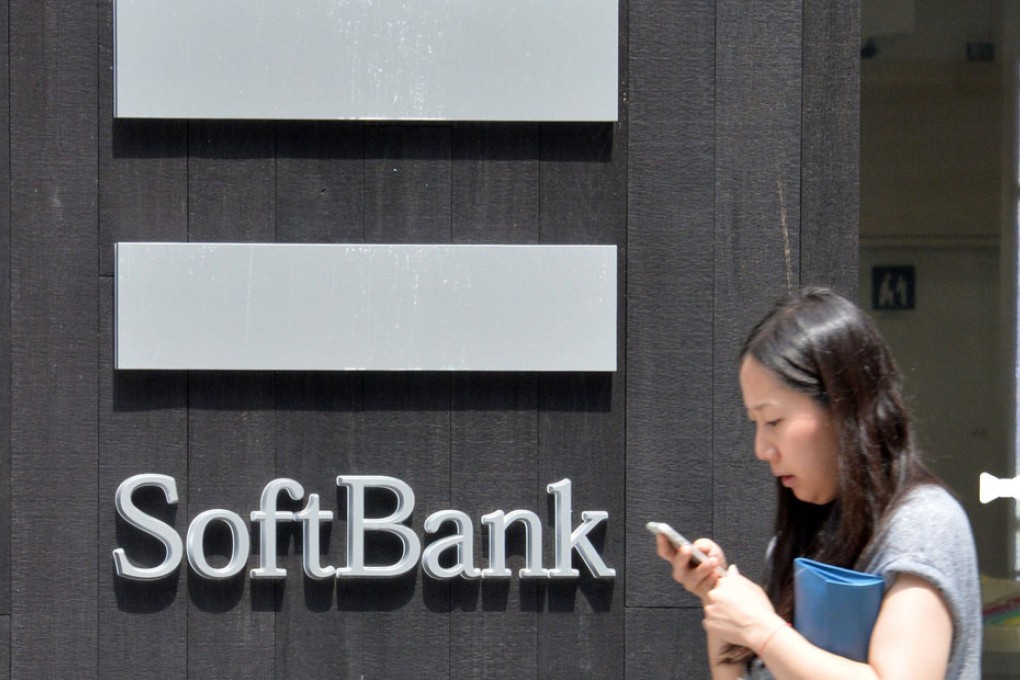 SoftBank is pursuing deals outside its home market to tap faster growth. Photo: AFP