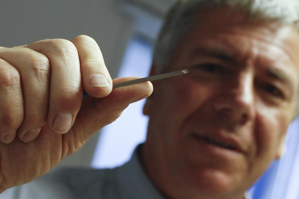 Garry Harvey, the official engraver of the Royal and Ancient Golf Club. Photo: AP