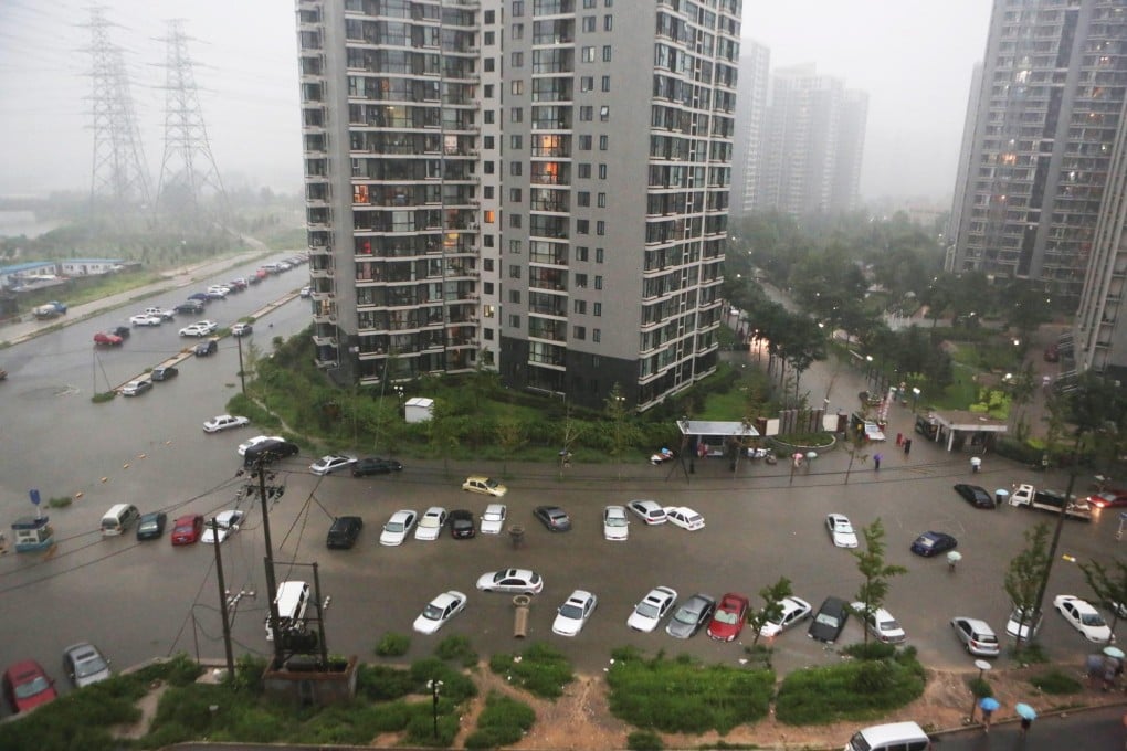 Cars that were submerged in last year's devastating floods. Photo: EPA
