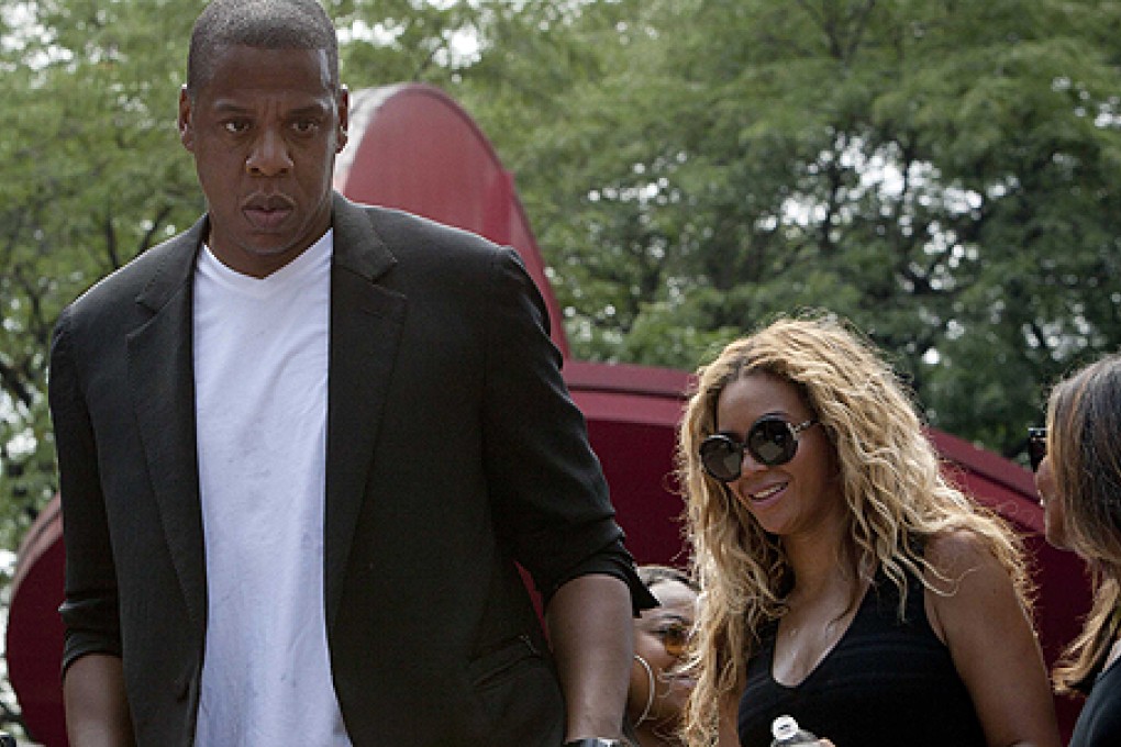 Celebrities Jay-Z (left) and Beyonce made surprise appearances at a Trayvon Martin rally in New York. Photo: Reuters