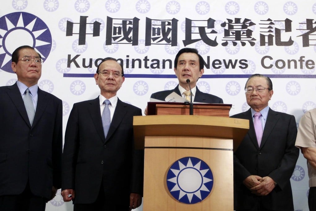Taiwan President Ma Ying-jeou (second, right) speaks to the media after winning re-election as KMT chairman yesterday. Photo: Reuters