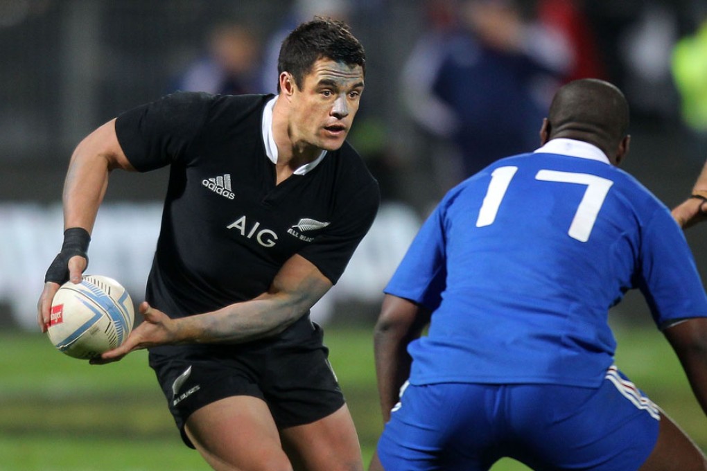 Dan Carter (Left). Photo: AFP