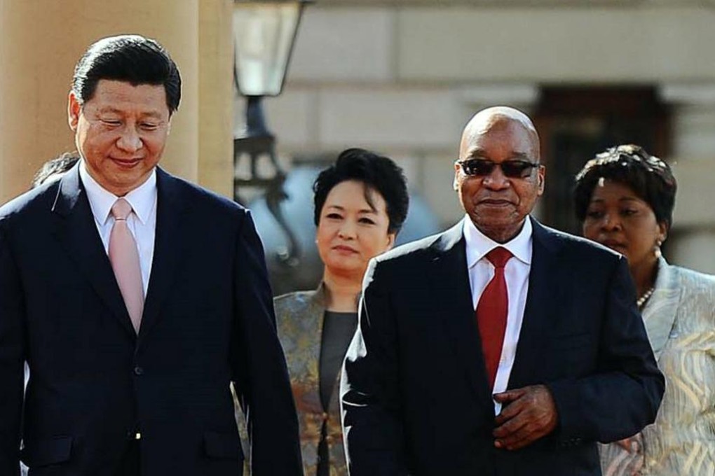South Africa's Jacob Zuma receives Xi Jinping. Photo: AFP