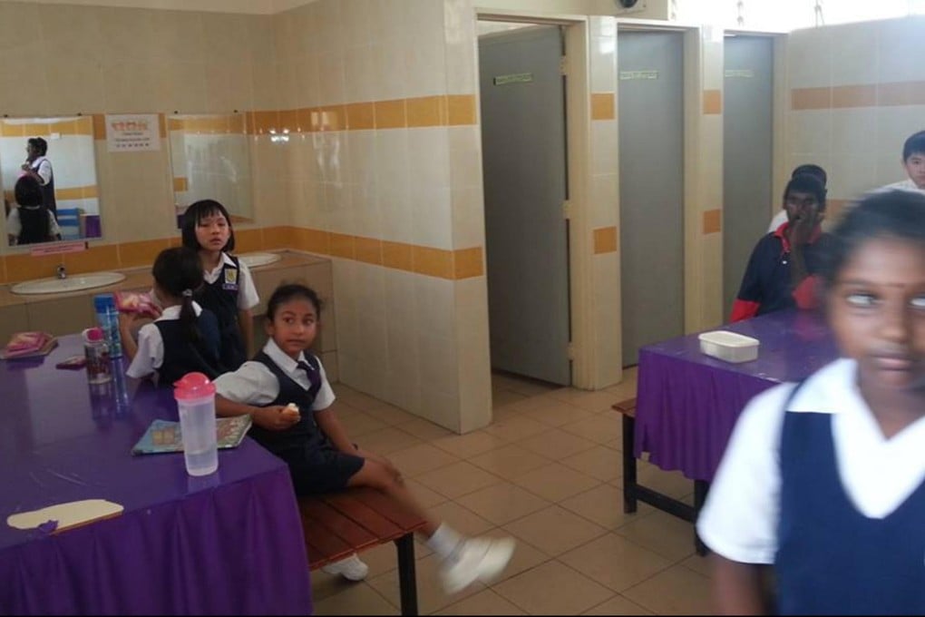 Non-Muslim pupils were told to eat their lunch in the changing area of the toilets at their school.Photo: SCMP Pictures