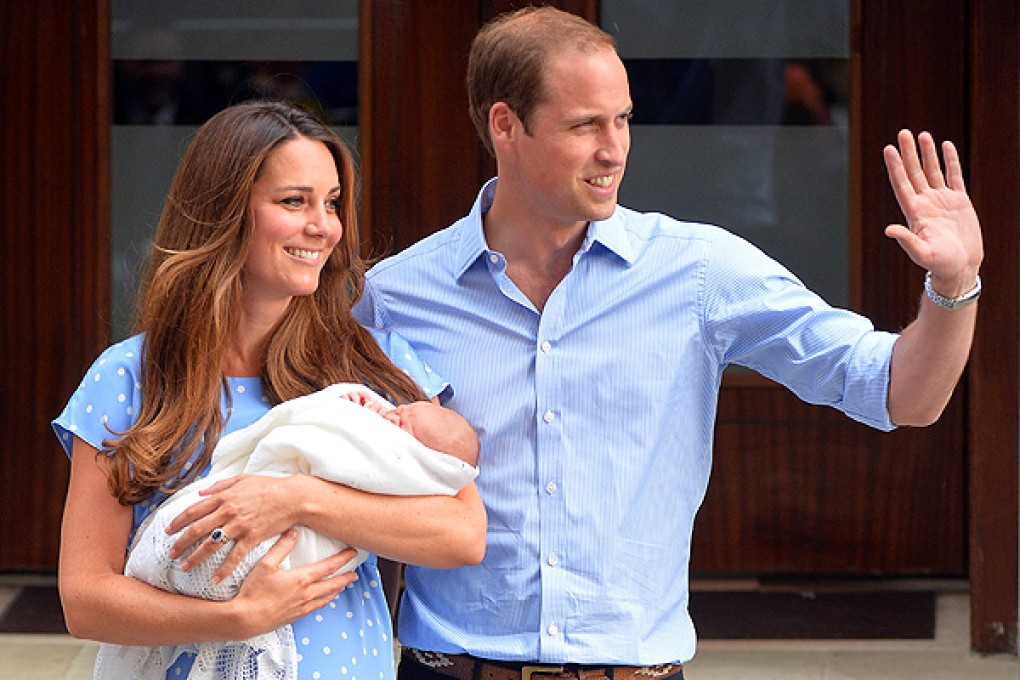 Prince William and Kate show their new-born baby boy to the world's media outside St Mary's Hospital in London. Photo: AFP