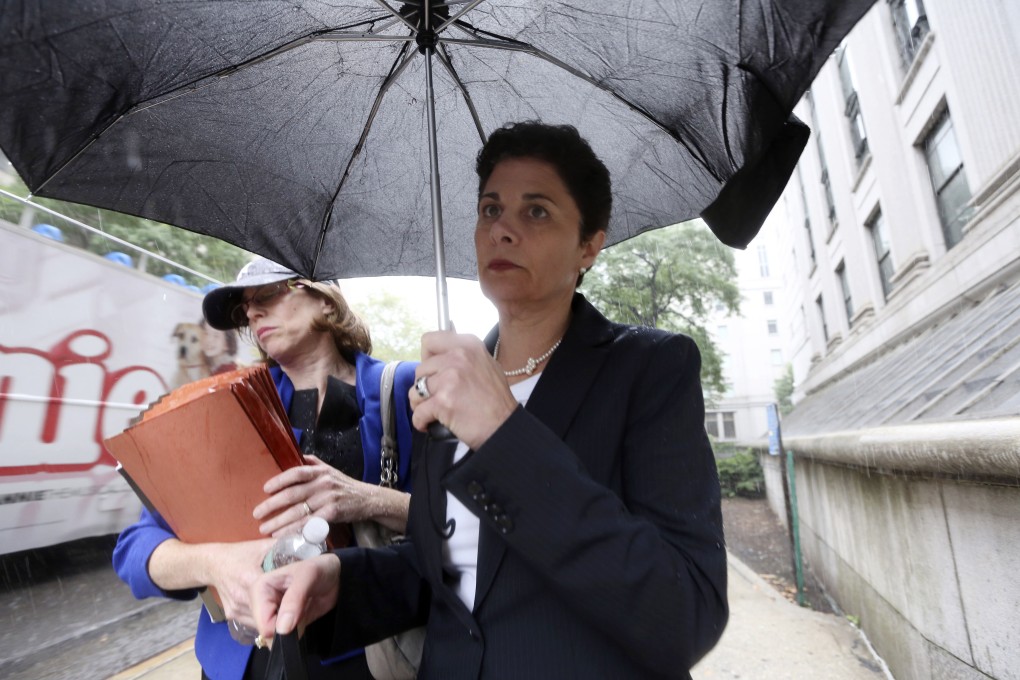 Laura Schwartz, a former executive at ACA Capital (right) leaves court after testifying in the trial of Fabrice Tourre. Photo: AP