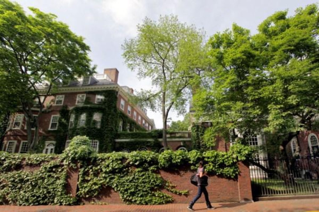 A student walks by buildings on the campus of Harvard University in Cambridge, Massachusetts. America's leading universities still attract many Hong Kong students. Photo: AP