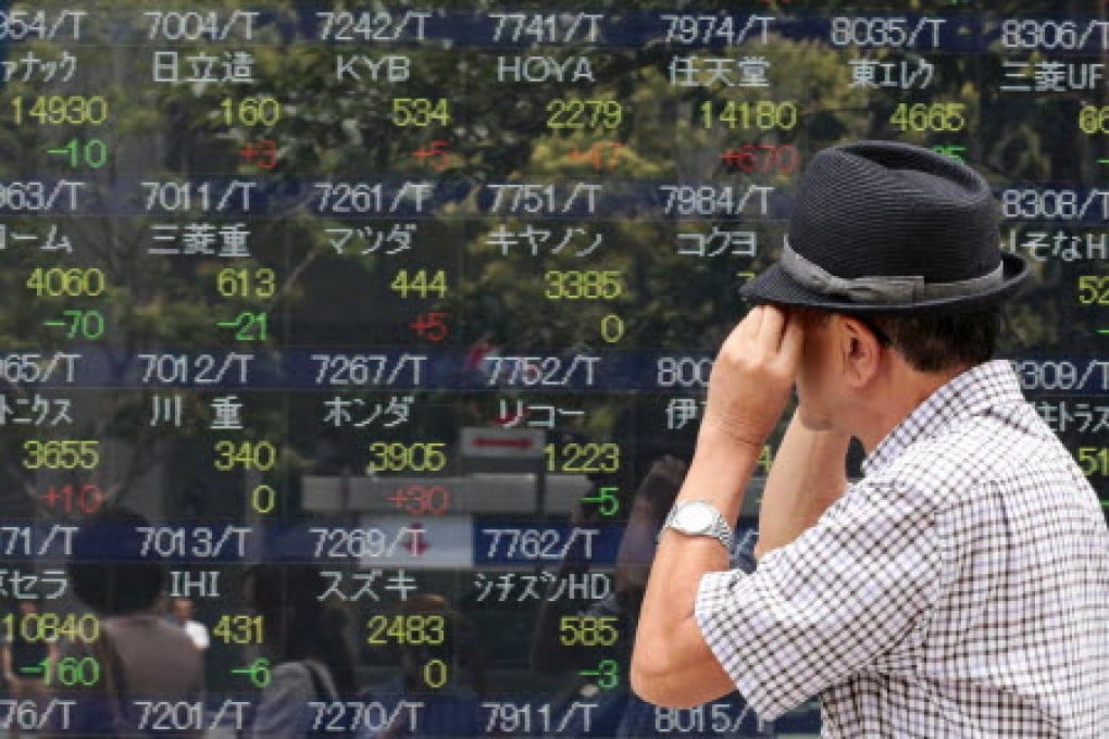 Japanese shares rose after Prime Minister Shinzo Abe’s ruling coalition solidified control of parliament in elections. Photo: Bloomberg