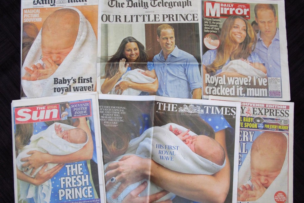 A selection of some British front pages headlining the birth of Prince George whimsically observed giving his first royal wave.Photo: AP