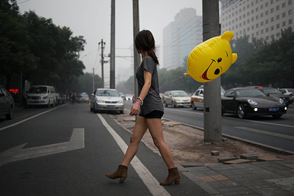 Heavy pollution covers Beijing in June. Photo: AFP