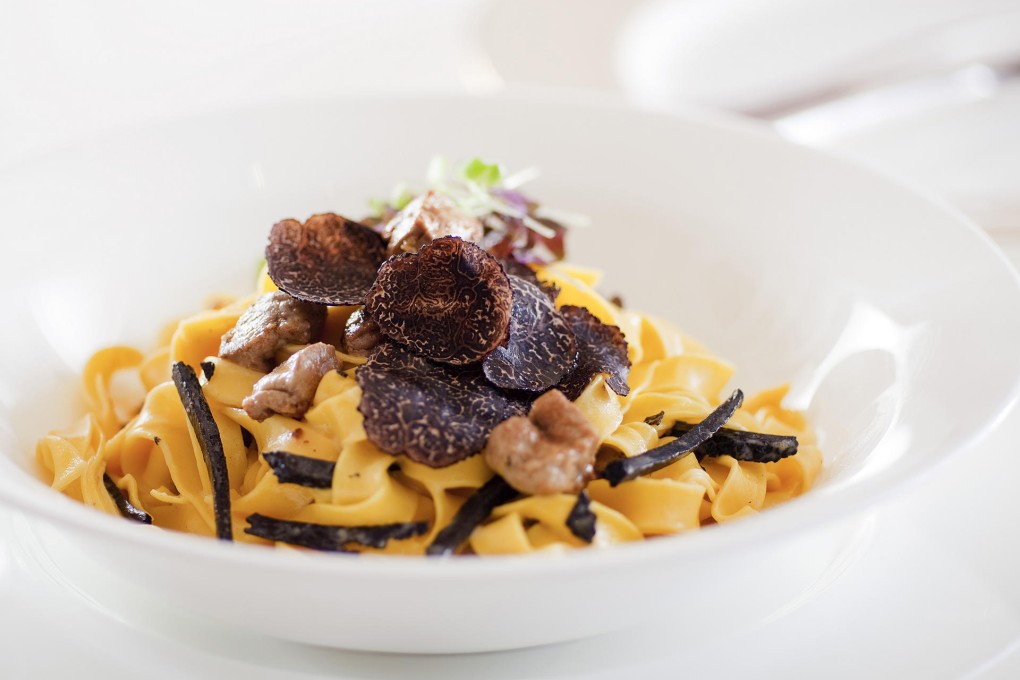 House-made egg noodles "Escoffier style" with sautéed goose liver and shaved black truffle from Brasserie on the Eighth