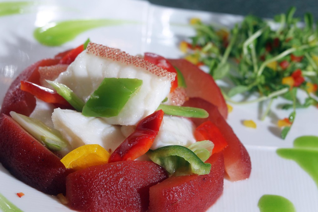 Garoupa fillets with pears and red wine from Cuisine Cuisine. Photo: May Tse