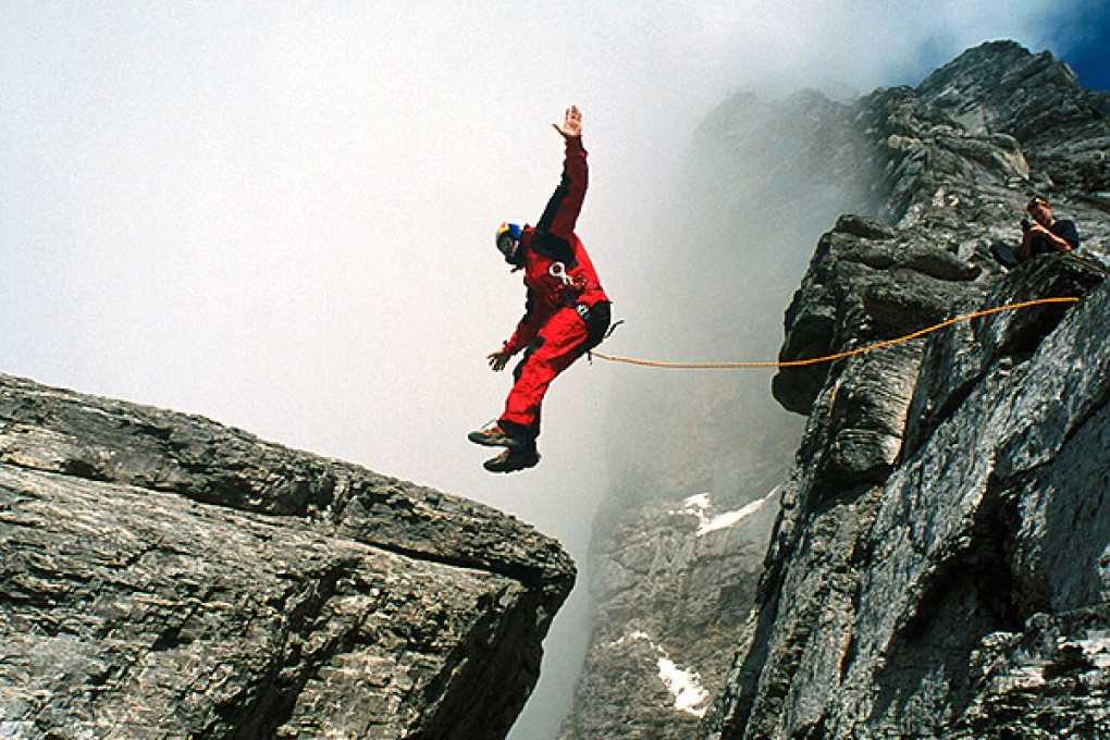 Base jumper Austrian Hannes in the Swiss Alps. Photo: Reuters