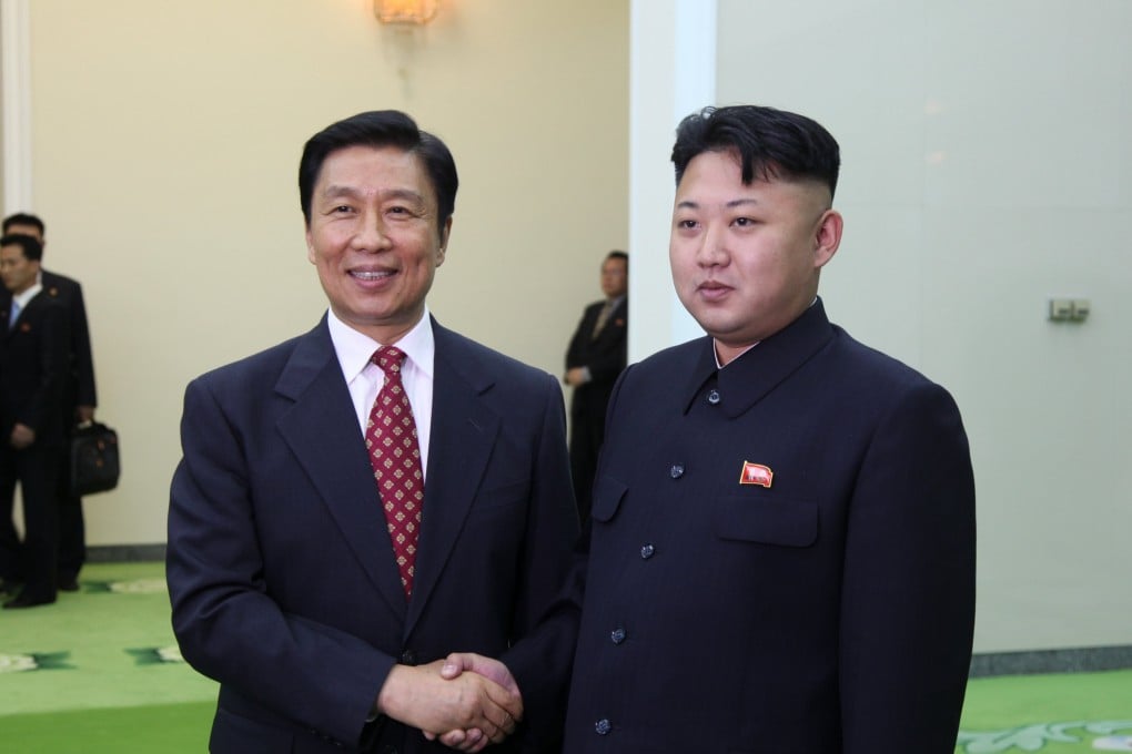 Kim Jong Un (right), top leader of the Democratic People's Republic of Korea, meets with visiting Chinese Vice President Li Yuanchao in Pyongyang. Photo: Xinhua