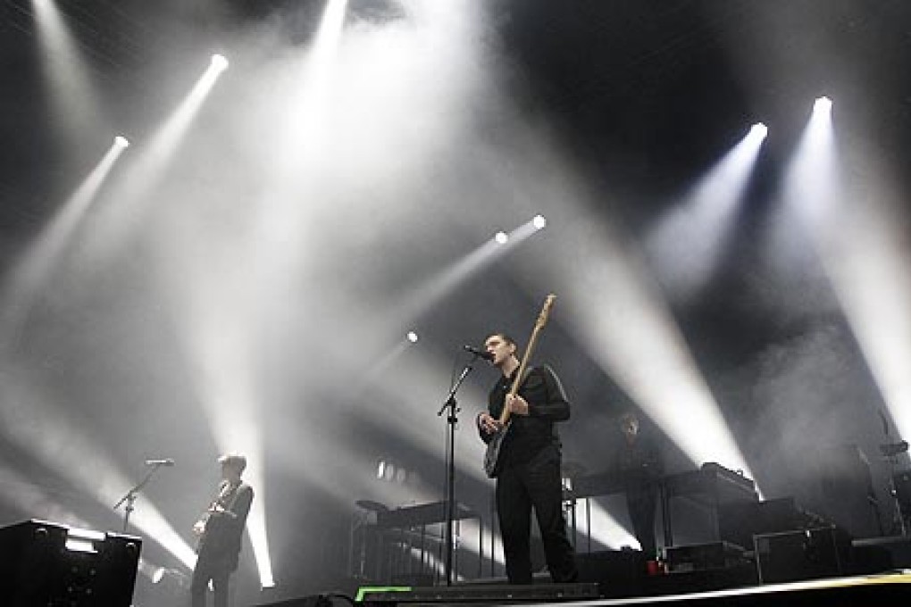 Romy Madley Croft (left), Oliver Sim and Jamie Smith of British band The XX perform during Positivus Festival in Salacgriva, Latvia, on July 21. Photo: EPA