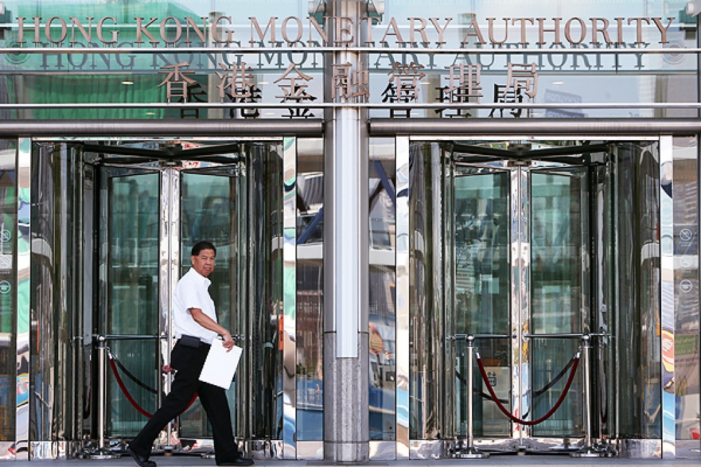 Hong Kong Monetary Authority orders banks to tighten credit control after an explosion in US dollar loans this May. Photo: Sam Tsang