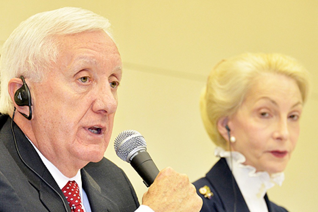 Nuclear Reform Monitoring Committee chairperson Dale Klein (left) speaks while deputy chairperson Barbara Judge looks on at a press conference on Friday. Photo: AFP