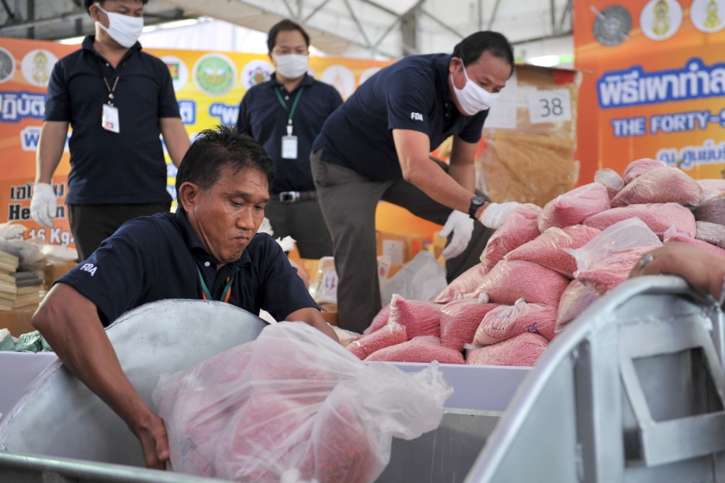 Workers seize illicit drugs in Thailand. Photo: Xinhua