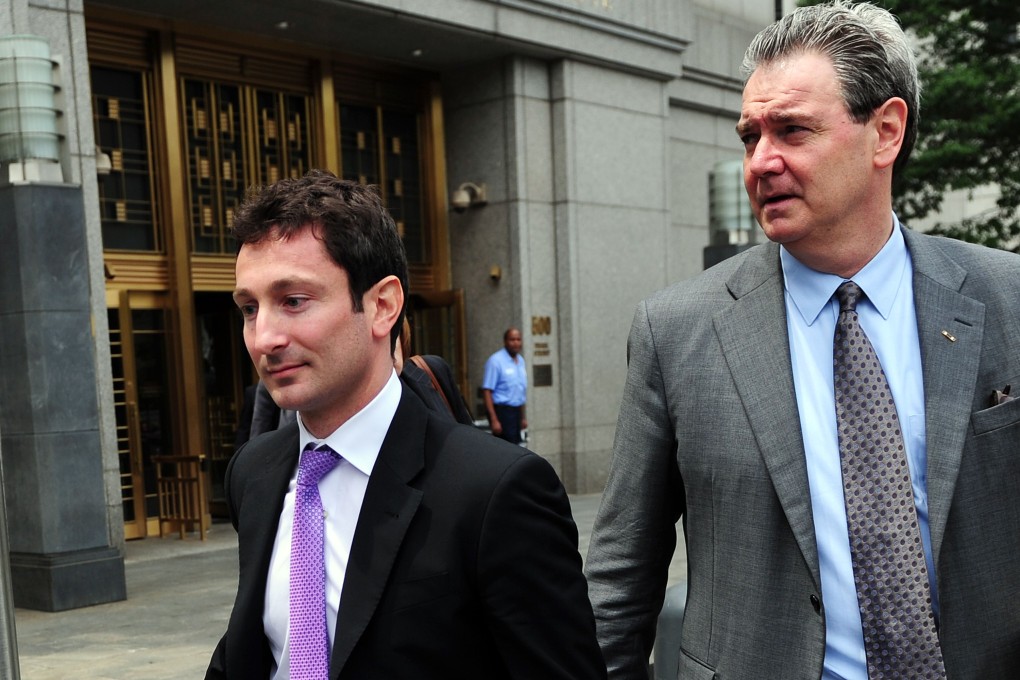 Fabrice Tourre (left) and his defence lawyer, Sean Coffey. Photo: AFP