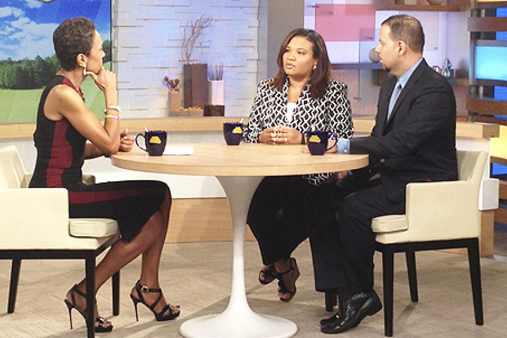 ABC reporter Robin Roberts (left) interviews Juror B29, the only minority juror from the George Zimmerman trial, along with her lawyer David Chico in New York. Photo: Reuters