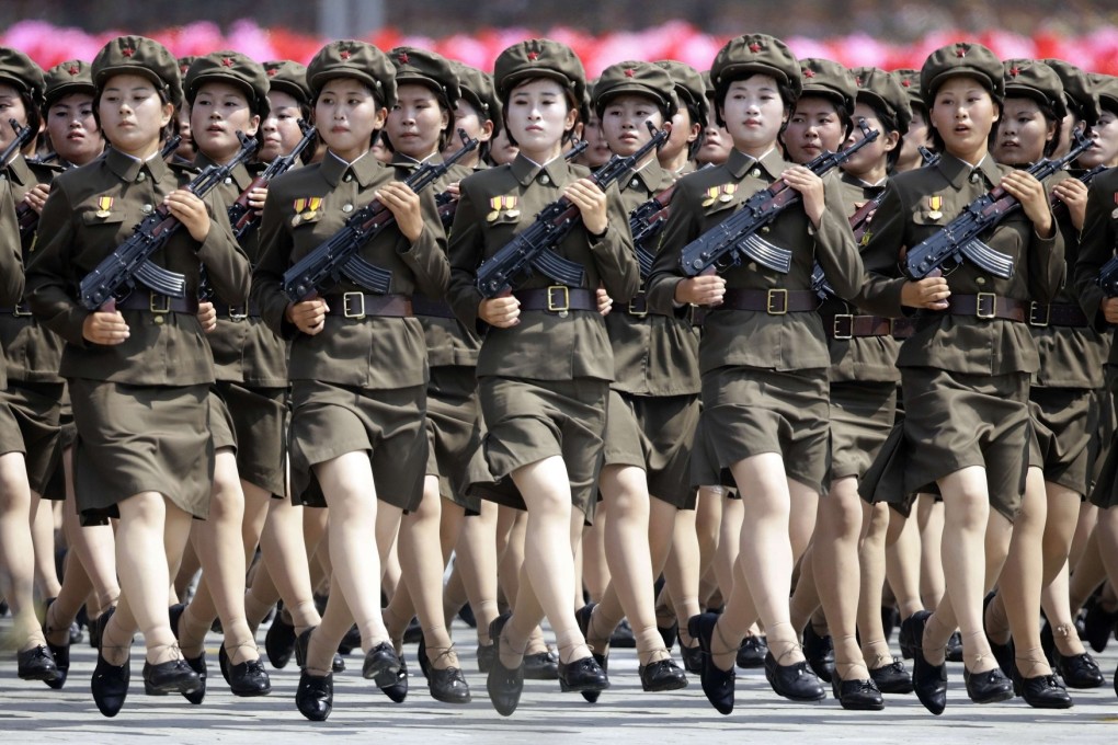 North Korean soldiers march in Pyongyang yesterday to mark the 60th anniversary of the Korean war armistice. Photo: Reuters