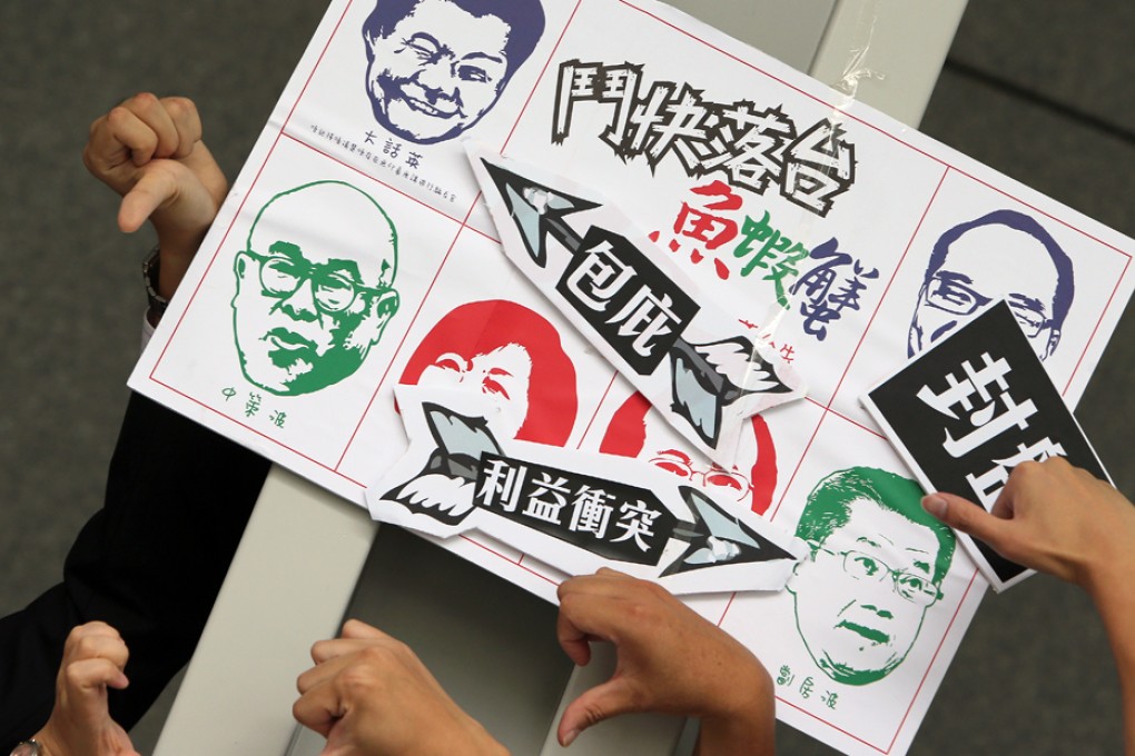 Protesters outside Legco call on Chan to go. Photo: Felix Wong
