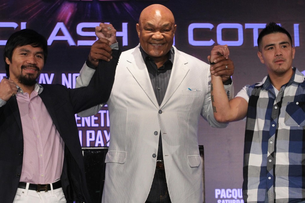 Manny Pacquiao, former world heavyweight champion George Foreman and the Filipino's next opponent, American Brandon Rios, get to together in Macau yesterday. Photo: Edward Wong