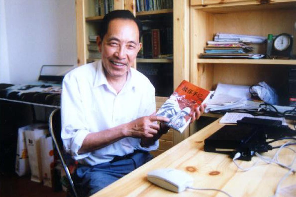 Zhang Zeshi with his book on life as a POW. Photo:Lijia Macleod