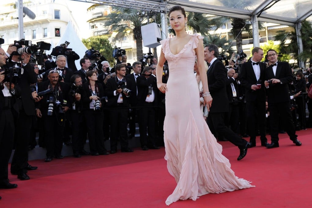 Taking their seat on the fashion front row: Korea's Gianna Jun. Photo: AFP