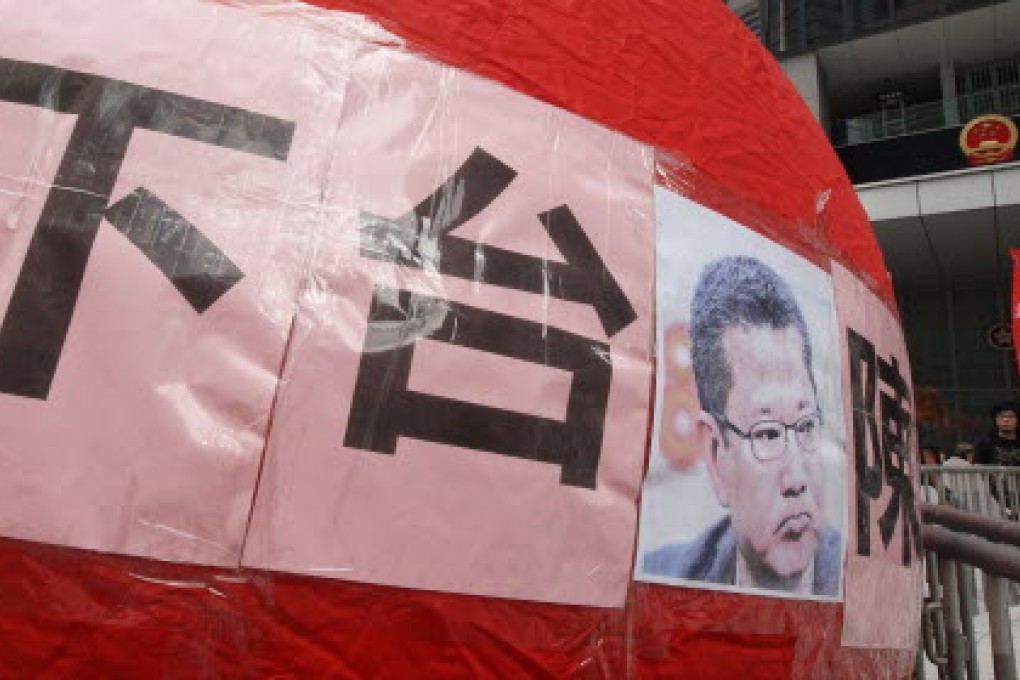 Hundreds of people have staged a protest march from Causeway Bay to the government office in Tamar, demanding the resignation of the Secretary for Development Paul Chan Mo-po. Photo: David Wong