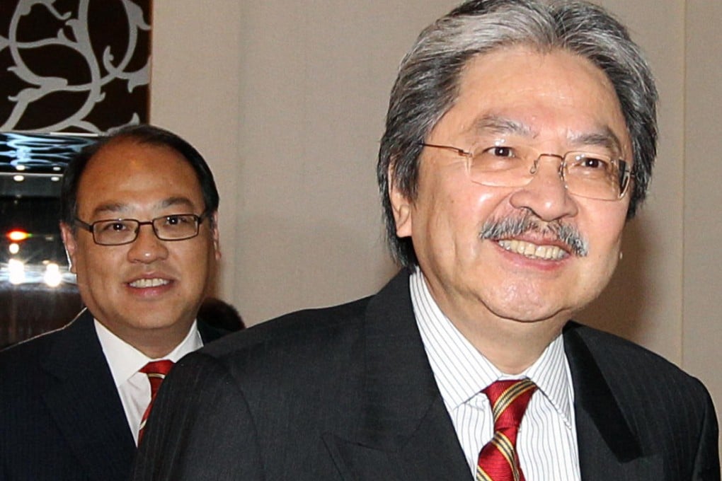 John Tsang, right, with Lam Tai-fai. Critics say Tsang is sitting on too big a cash pile. Photo: Sam Tsang