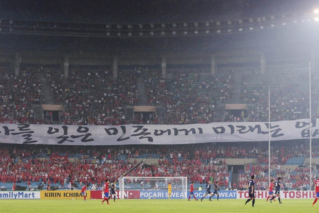 The controversial anti-Japanese banner unfurled at the East Asian Cup final in Seoul. Photo: Reuters