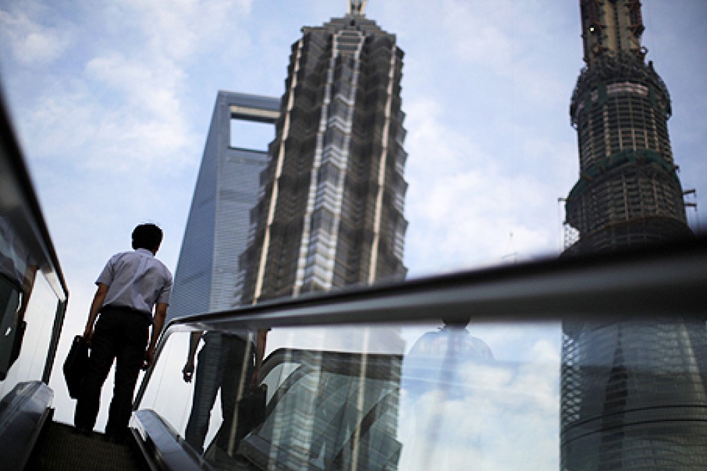 The financial district in Shanghai. The Chinese government has unveiled plans to step up spending in several carefully selected areas - social housing, urban infrastructure, high-speed rail. Photo: Reuters