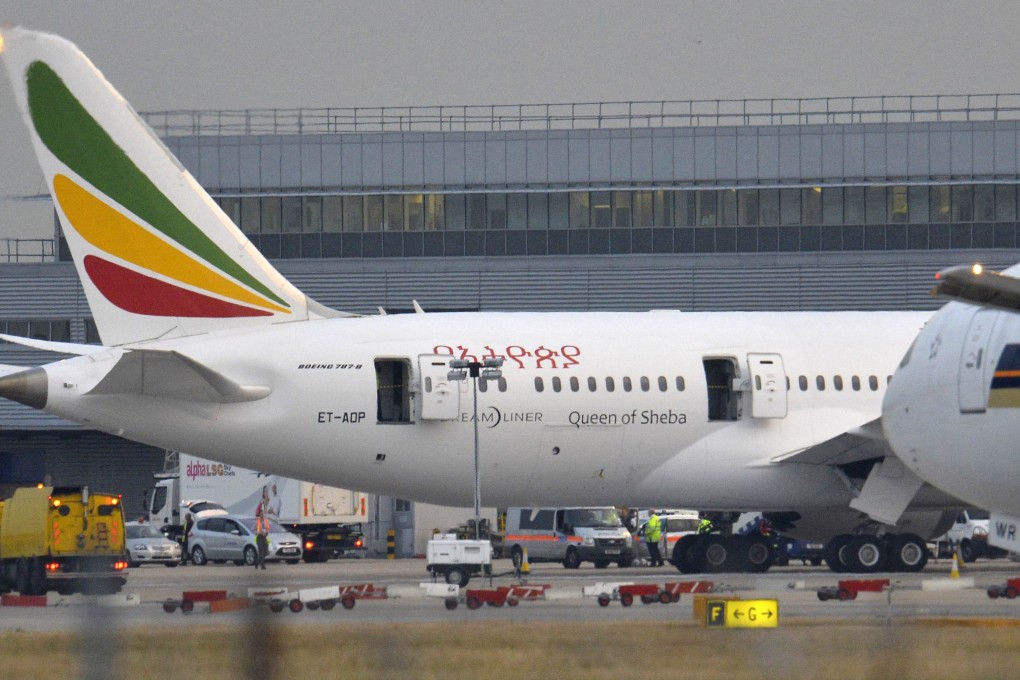 Emergency services attend a fire on an Ethiopian Airlines Dreamliner at Heathrow airport. Photo: Reuters