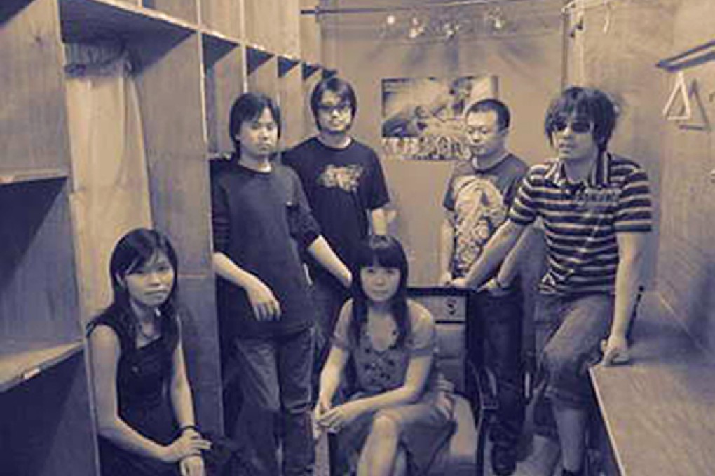 Happy Avenue lead singer Wu Hongfei (seated) pictured in 2011. Photo: SCMP