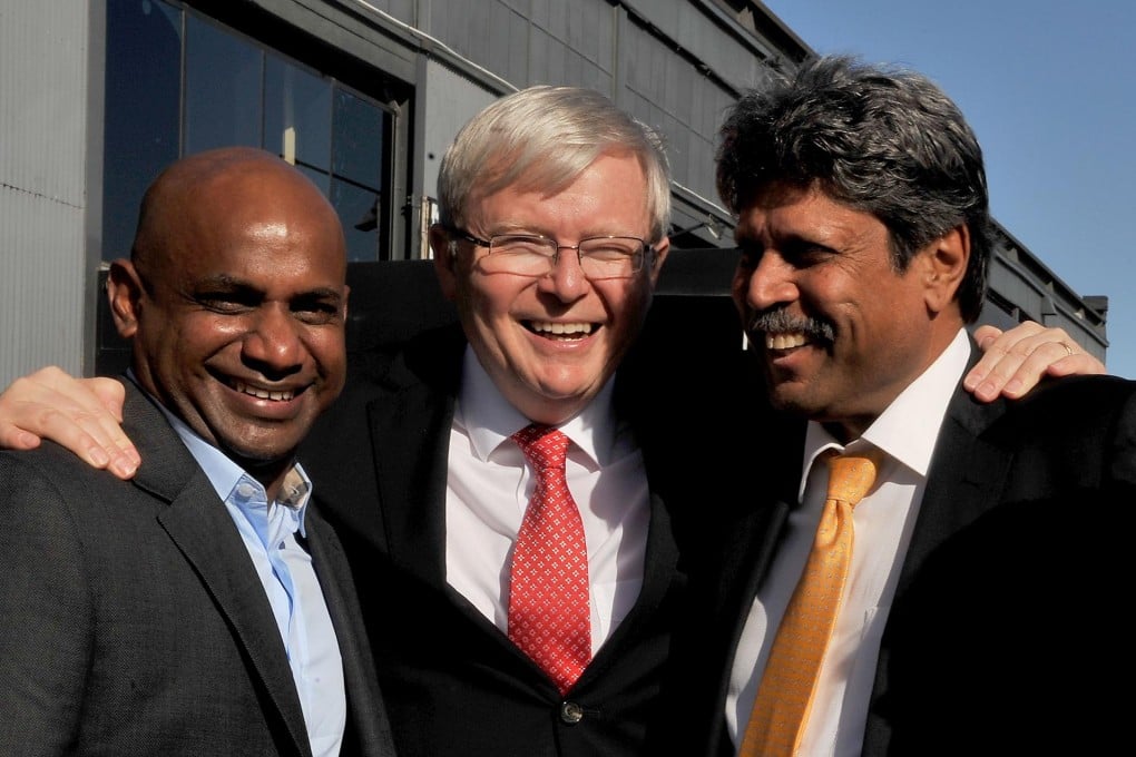 Australia's Prime Minister Kevin Rudd is flanked by cricket greats Sanath Jayasuriya (left) of Sri Lanka and Kapil Dev (right) of India at the official launch of the 2015 World Cup. Photo: AFP