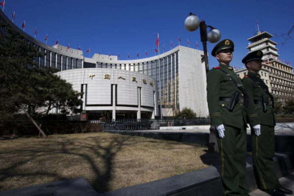 People's Bank of China stepped in to rescue the troubled stock and interbank markets with the first cash injection since February. Photo: AP