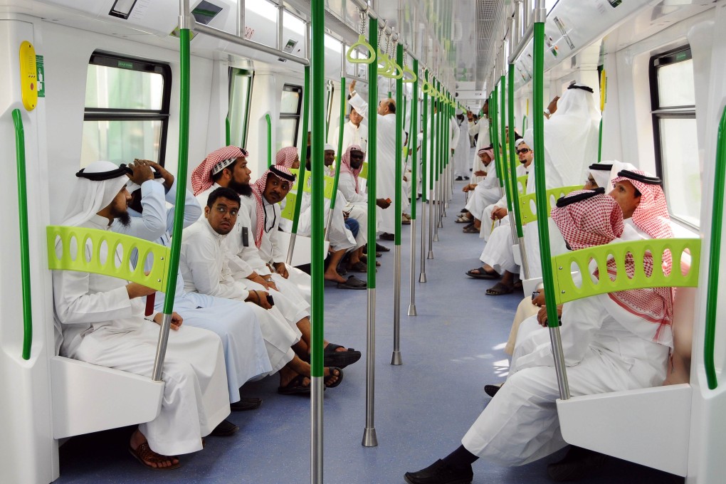 Saudi Arabians ride on the Holy Sites metro light rail in the western city of Mecca. Saudi Arabia has granted three foreign consortiums contracts to build a US$22.5 billion Riyadh metro. Photo: AFP
