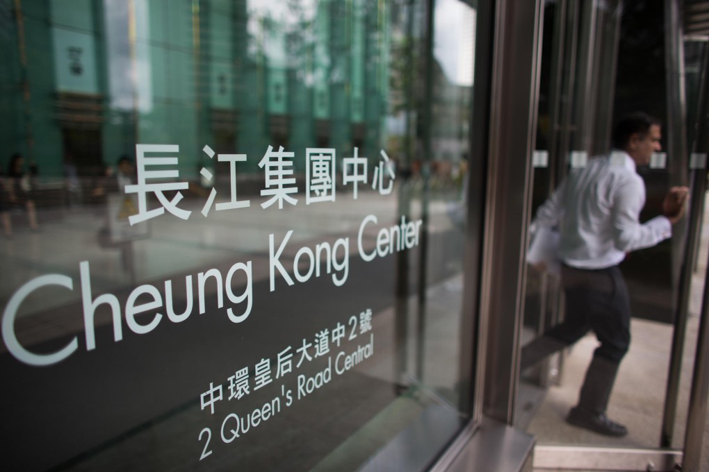 Earnings at Cheung Kong, with its head office in Central, have been weighed down by the government's property cooling measures. Photo: Bloomberg