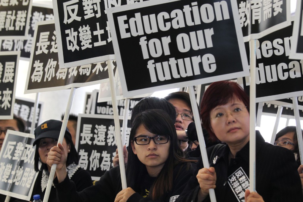 Baptist University student union stages a rally at Legislative Council, Tamar which urges the government to withdraw the plan to rezone the land of the former VTC (Lee Wai Lee) in Kowloon Tong. Photo: Dickson Lee