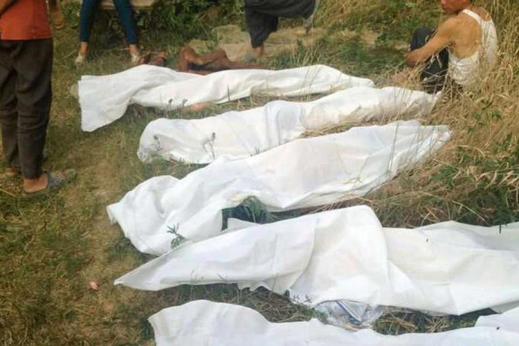 Photo taken by mobile phone shows the five students' bodies wrapped up by white sheets. Photo: Xinhua