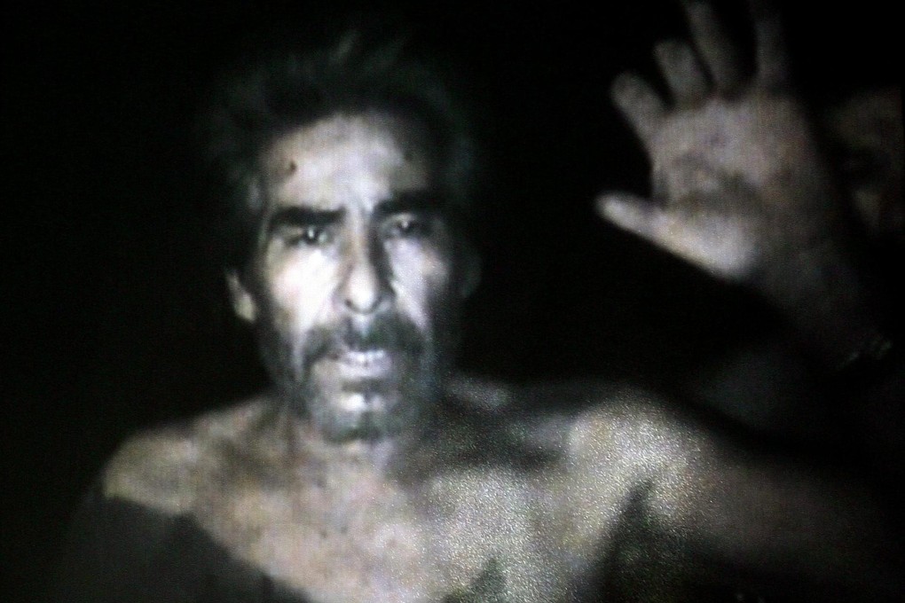 One of the 33 miners during their ordeal. Photo: EPA