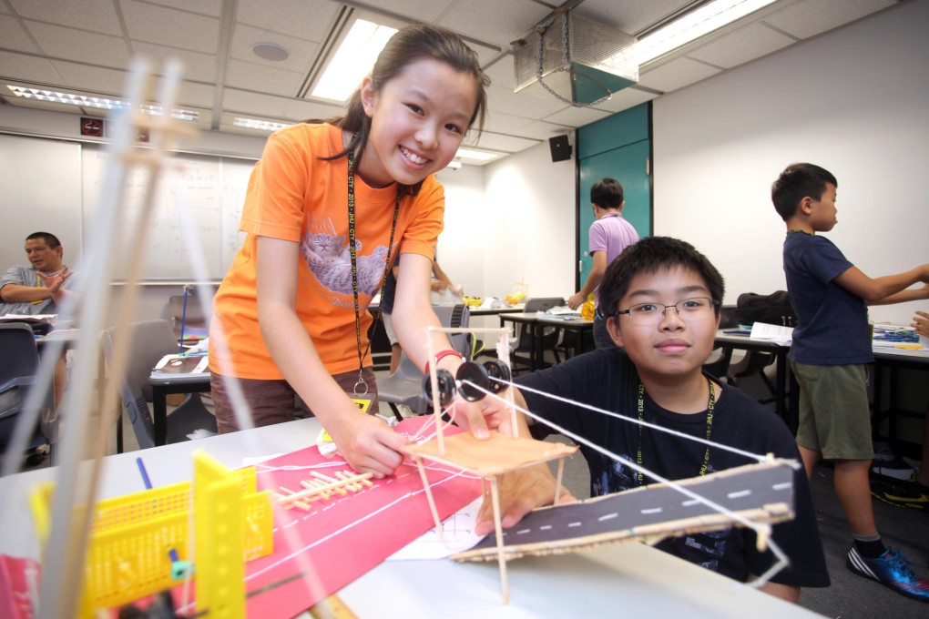 Students build a model at the summer camp for talented youngsters. Photo: Paul Yeung