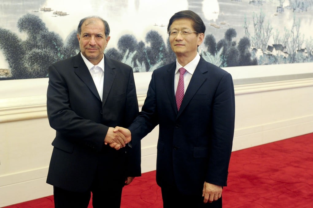 Meng Jianzhu, a member of the Political Bureau of the Communist Party of China (CPC) Central Committee, with Iran's Interior Minister Mostafa Mohammad-Najjar in Beijing. Photo: Xinhua