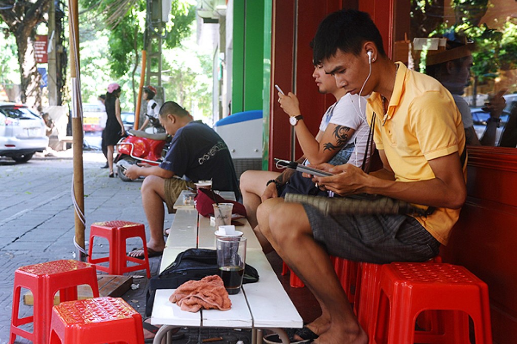 Vietnam has banned bloggers and social media   users from sharing news stories online. Photo: AFP