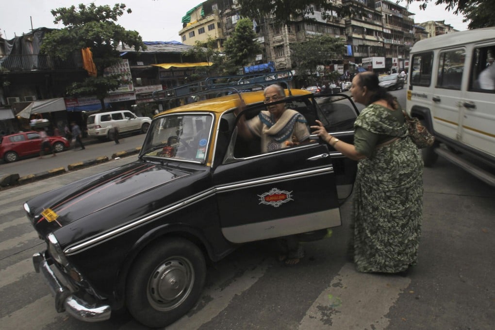 The Padmini taxis are a much-loved part of Mumbai life, despite production ceasing in 2000.Photos: AP
