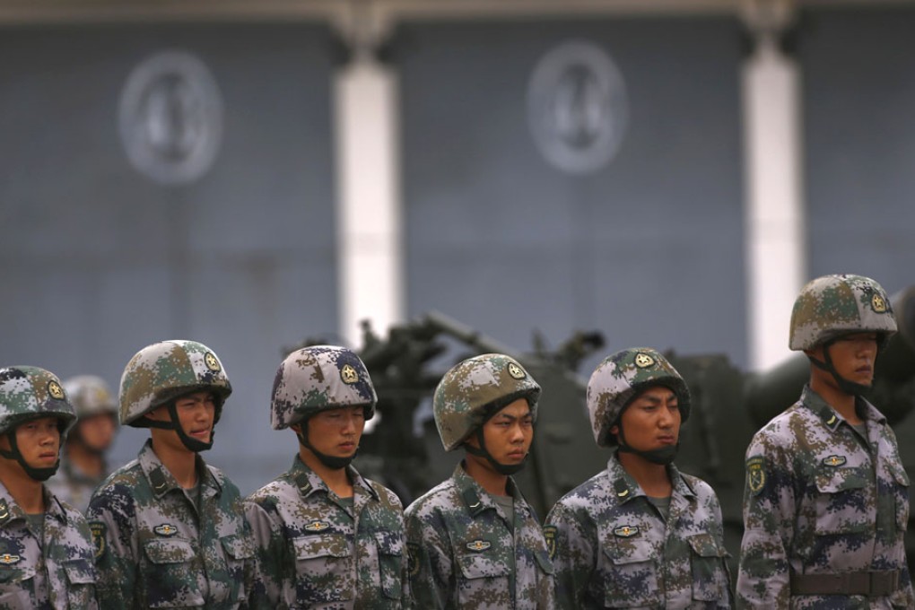 Academic confirms that senior officer faces corruption probe, and also calls for more modern military to deal with maritime disputes. Photo: Reuters