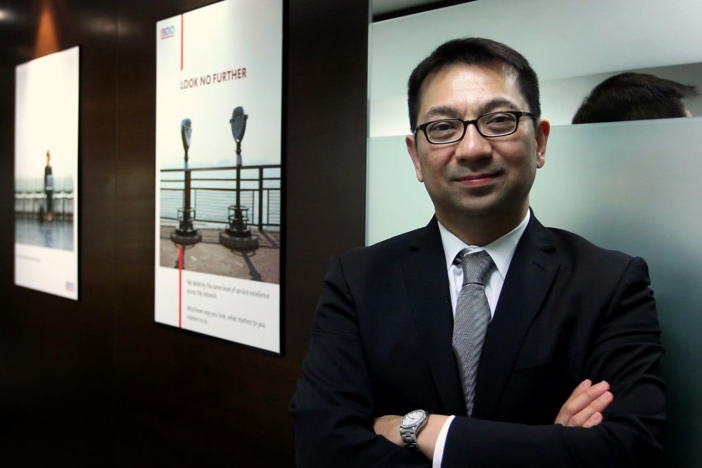 BDO's Patrick Rozario says mainland firms pay their directors less because they are often appointed by the government. Photo: Jonathan Wong