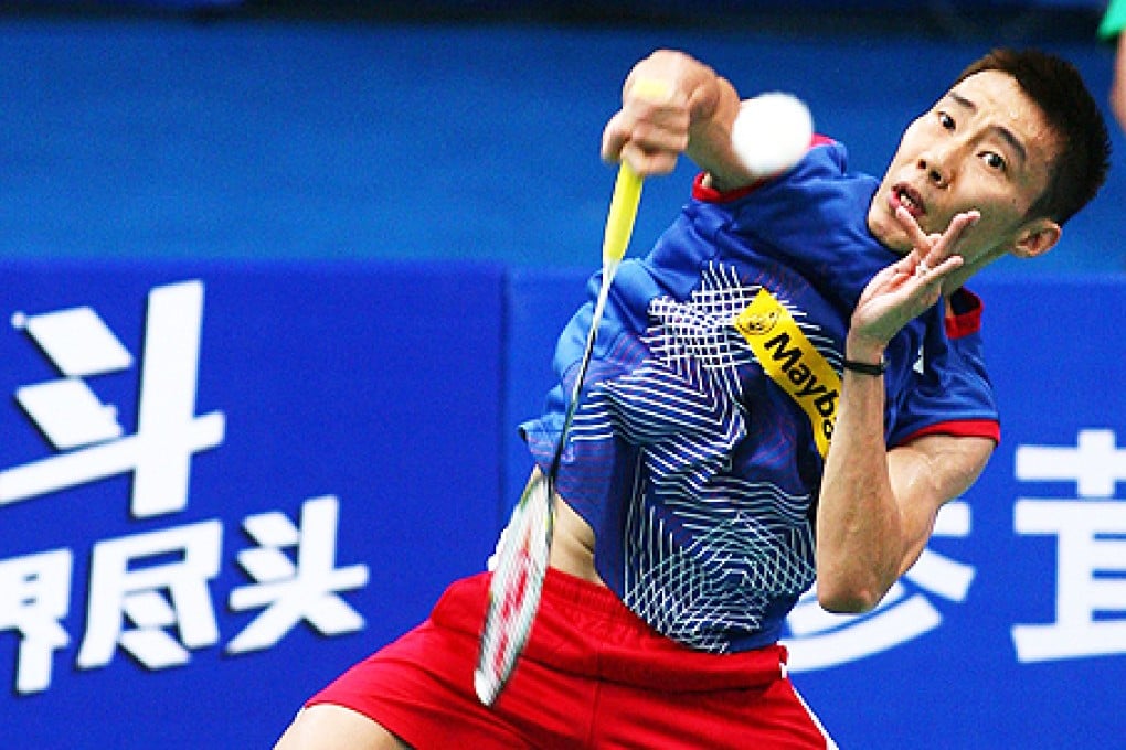 Malaysia's Lee Chong Wei returns a shot to Ireland's Scott Evans during their men's singles match in the first round of the Badminton World Championships in Guangzhou, Guangdong province, on Monday. Photo: Reuters
