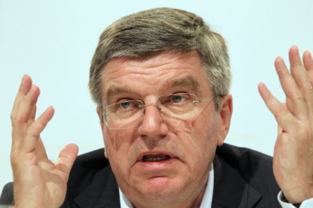 German Olympic Sports Confederation president Thomas Bach speaks at a forum. Bach is calling for the early publication of a report that claims West Germany's athletes were systematically doped with government backing. Photo: AP